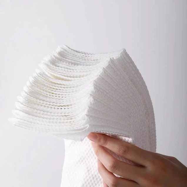 Food Contact Safe Absorbent Pads holding by a hand